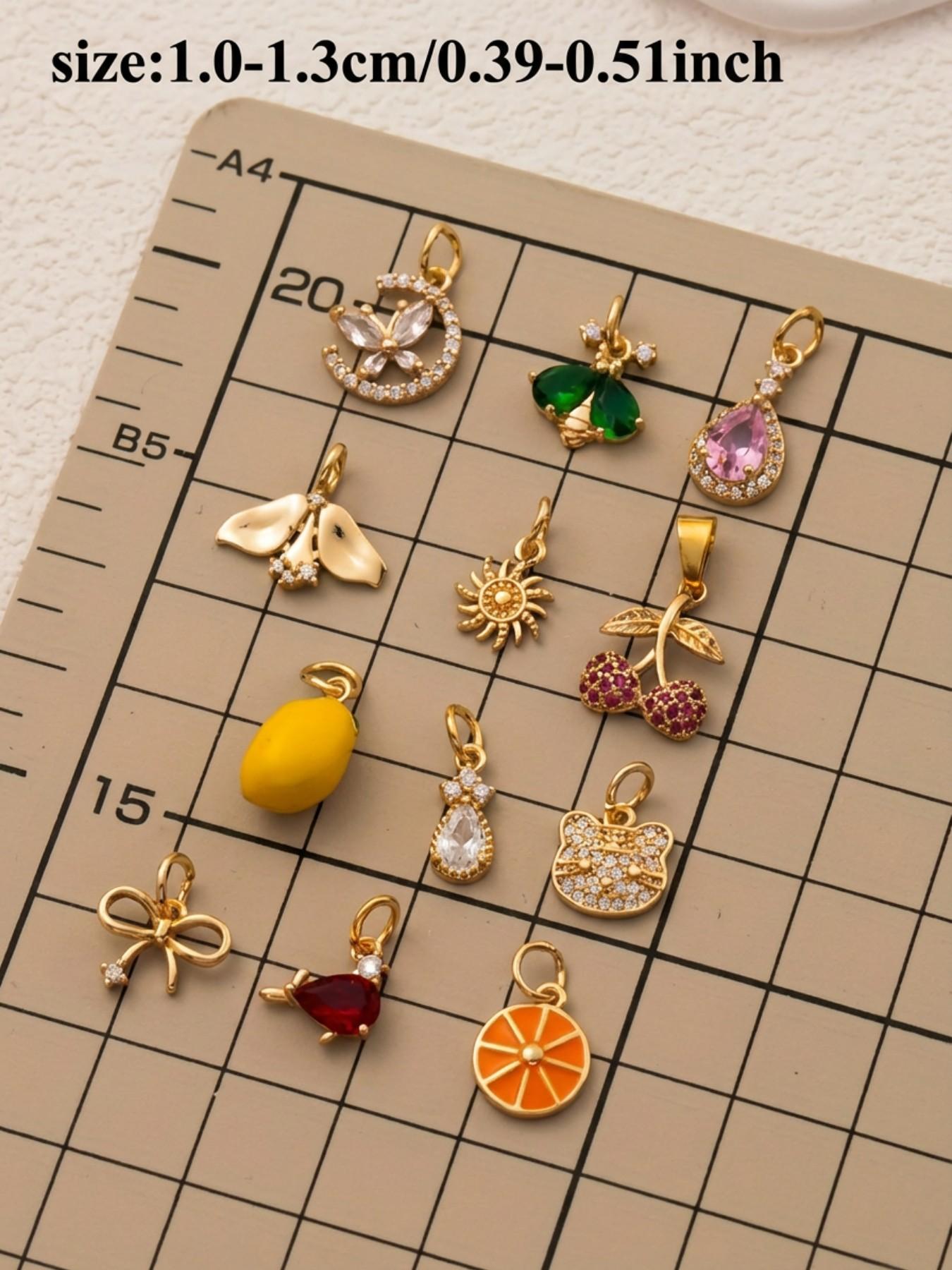 1PC stylish commuter bohemian style pendant, set with synthetic cubic zirconia, featuring a bow, butterfly moon, lemon cherry, and other fruit motifs. Made of 18K gold-plated copper, this DIY fashion accessory is suitable for keychains, bags, and jewelry.
