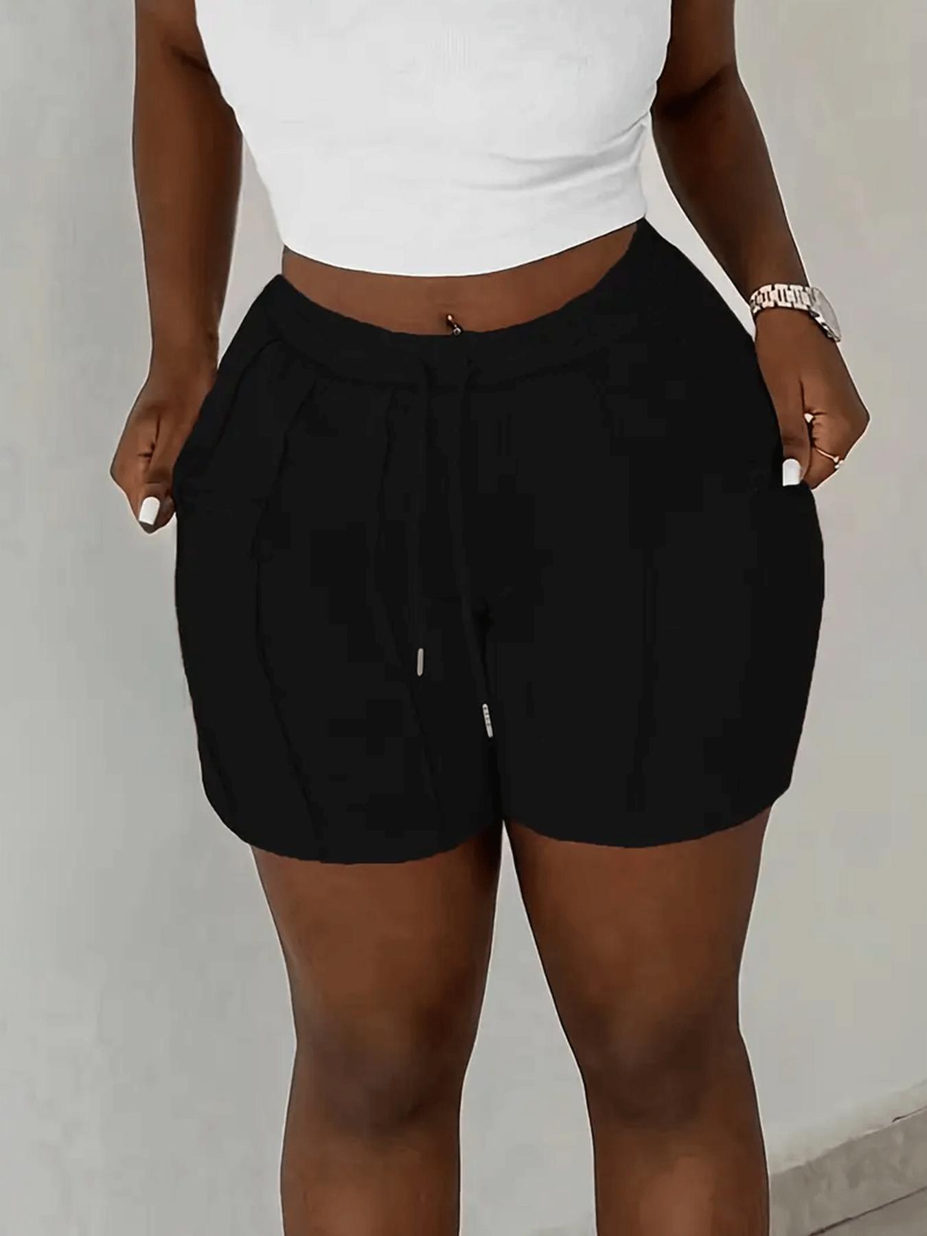 Pack of 2 solid-color drawstring athletic shorts with an elastic waistband and slanted pockets, casual style, suitable for spring, summer, and autumn.