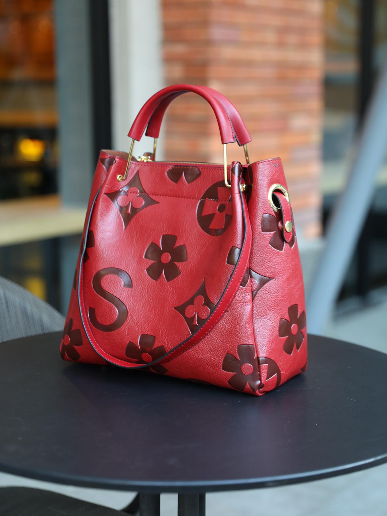 An elegant floral embossed faux leather handbag - suitable for women's use - fade resistant zipper tote bag - equipped with fixed shoulder straps - polyester lining - edge painted - suitable for work and various occasions