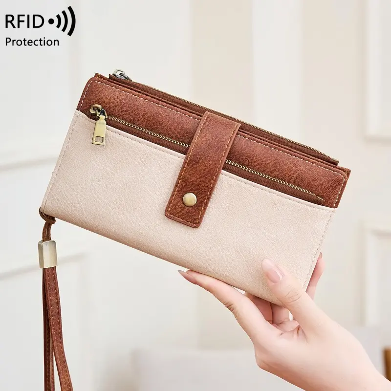 Women's RFID-blocking PU wallet—a tri-fold long wallet and clutch featuring a detachable wrist strap. Designed with a vintage style and high-capacity storage (accommodating cards and cash), it offers a secure and convenient option for daily use