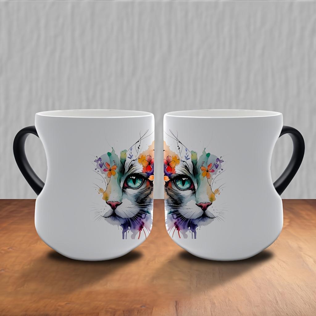 Playful Watercolor Cat Flower Decor: A vibrant artistic depiction set in a color-changing ceramic mug that changes color with temperature and features a heart-shaped handle. Perfect for coffee, this 11oz/330ml mug makes a wonderful Christmas gift