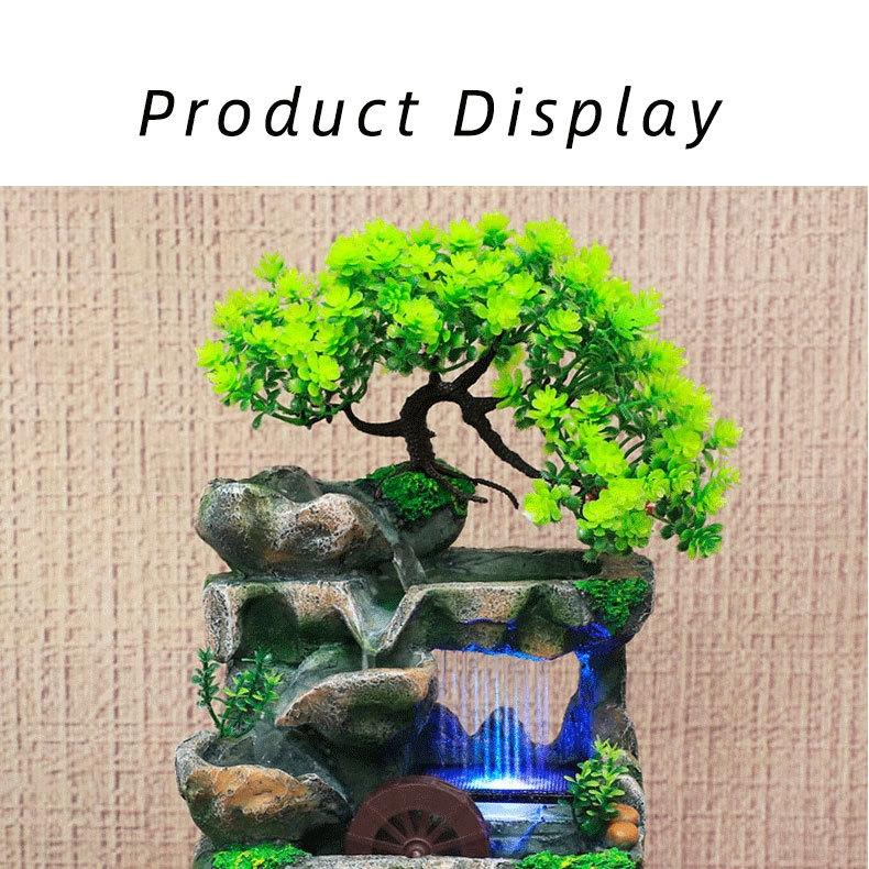 The Creative Cycle Water Flow Desk Ornament is a resin sculpture inspired by miniature natural landscapes, featuring an integrated small water pump to achieve a continuous water circulation flow