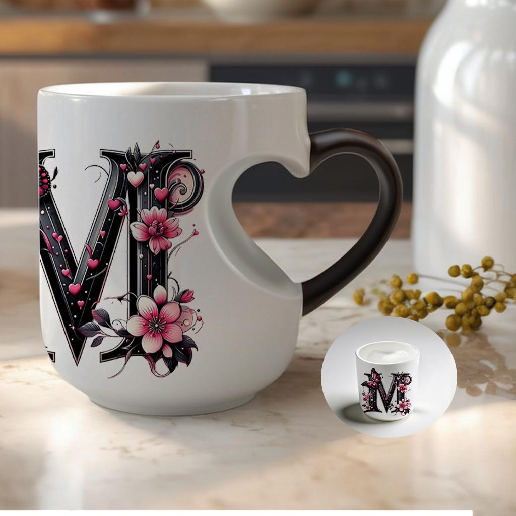 Heat-changing ceramic mug with pink butterfly and floral motif, heart-shaped handle, 11 oz/330 ml capacity. This color-changing thermos is perfect for hot and cold beverages.