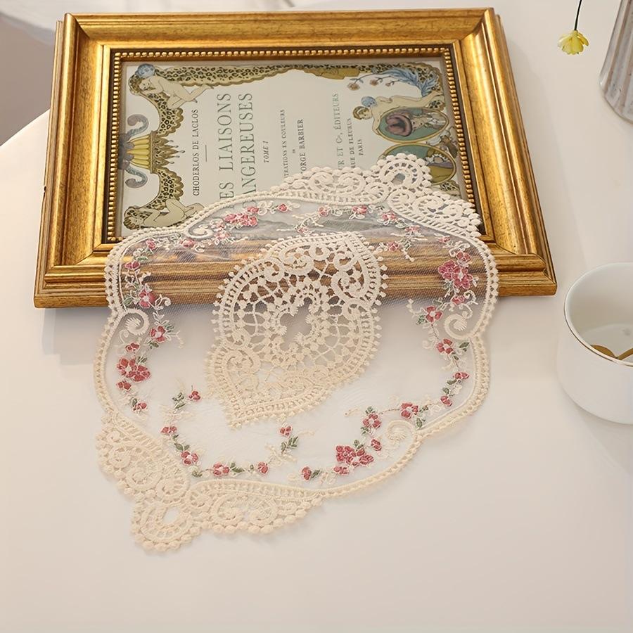 1 piece, a vintage-style handmade crochet round mat with polyester fabric, featuring elegant hollow designs and floral motifs, suitable for weddings, dining utensils, parties, Valentine's Day, Easter, St. Patrick's Day, and carnival celebrations.