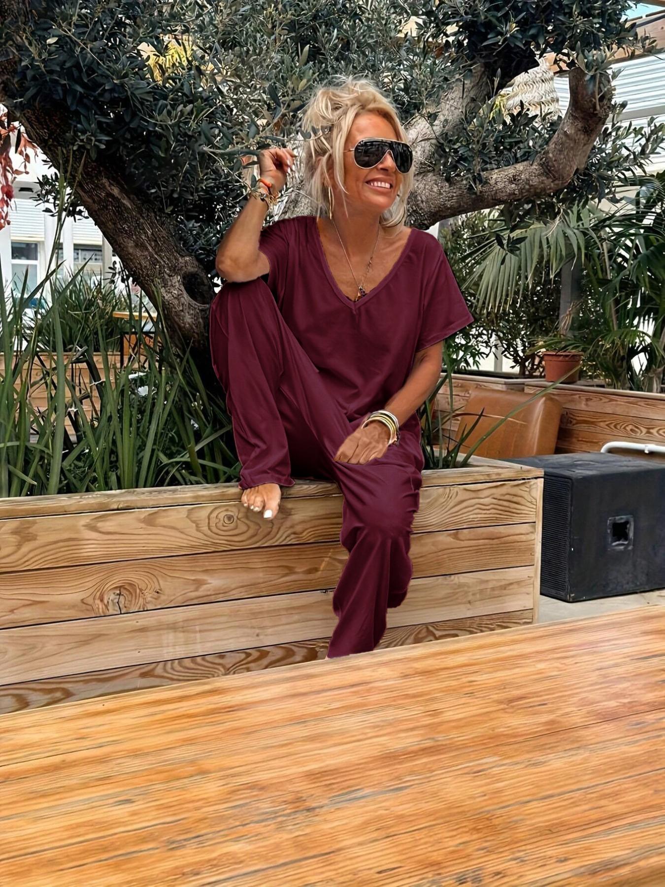 Women's Summer V-Neck Oversized Minimalist Jumpsuit, Sexy Backless Loose Fit Harem Pants, Casual Streetwear for All Seasons Womenswear