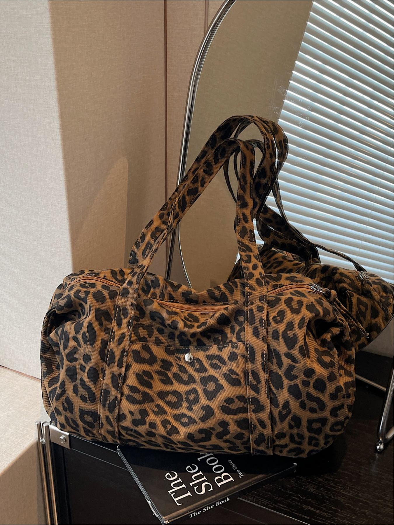 Large capacity denim leopard print luggage bag, made of tough fabric suitable for urban life, with non glaring prints, niche design, versatile tote bag, convenient sports bag, Denim shoulder satchel