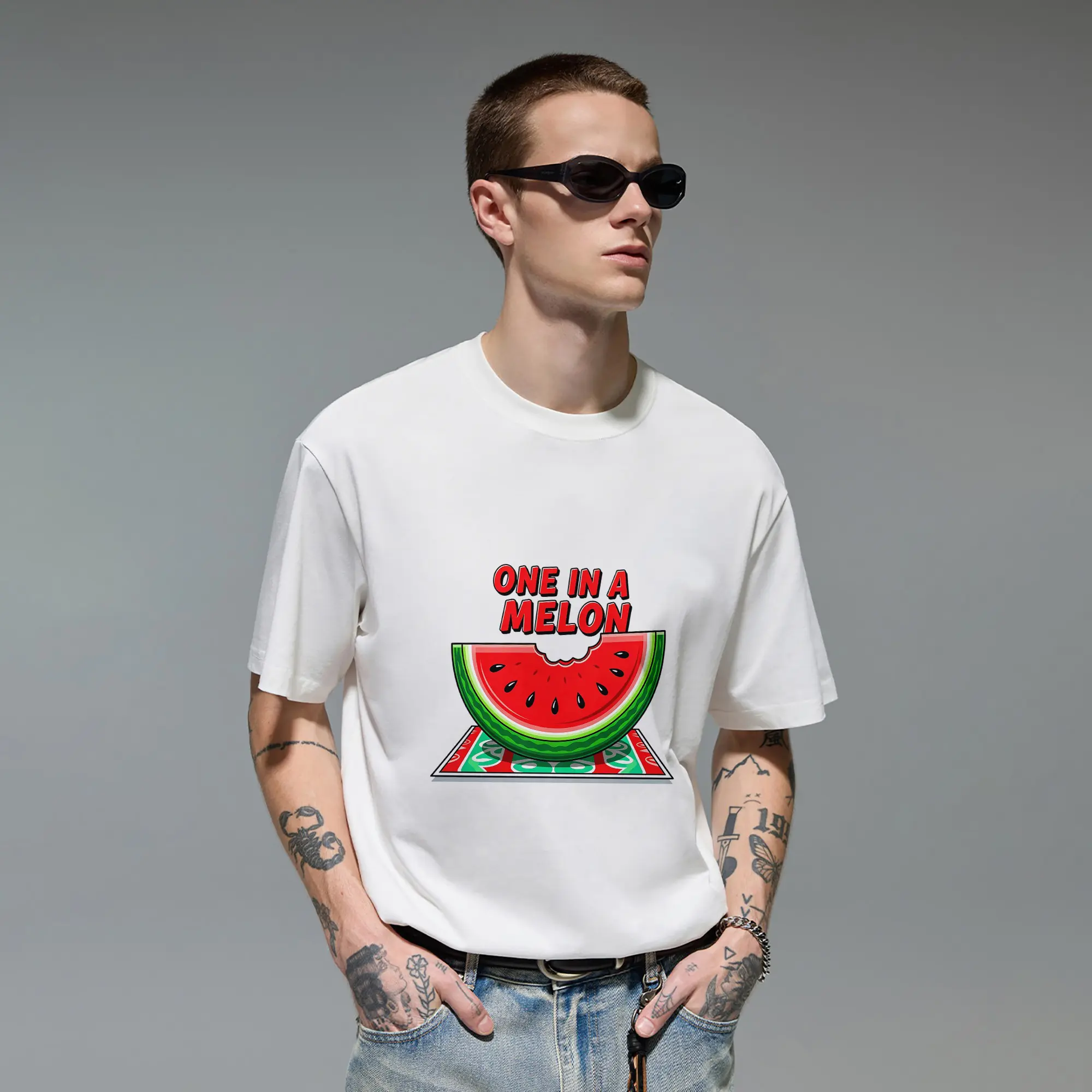 Men’s Soft Breathable Cotton Crew Neck T-Shirt, One In A Melon watermelon graphic tee, featuring cartoon juicy watermelon slice artwork matched with bold fun summer letter print. Casual short sleeve streetwear top, suitable for daily outfits, summer gathe