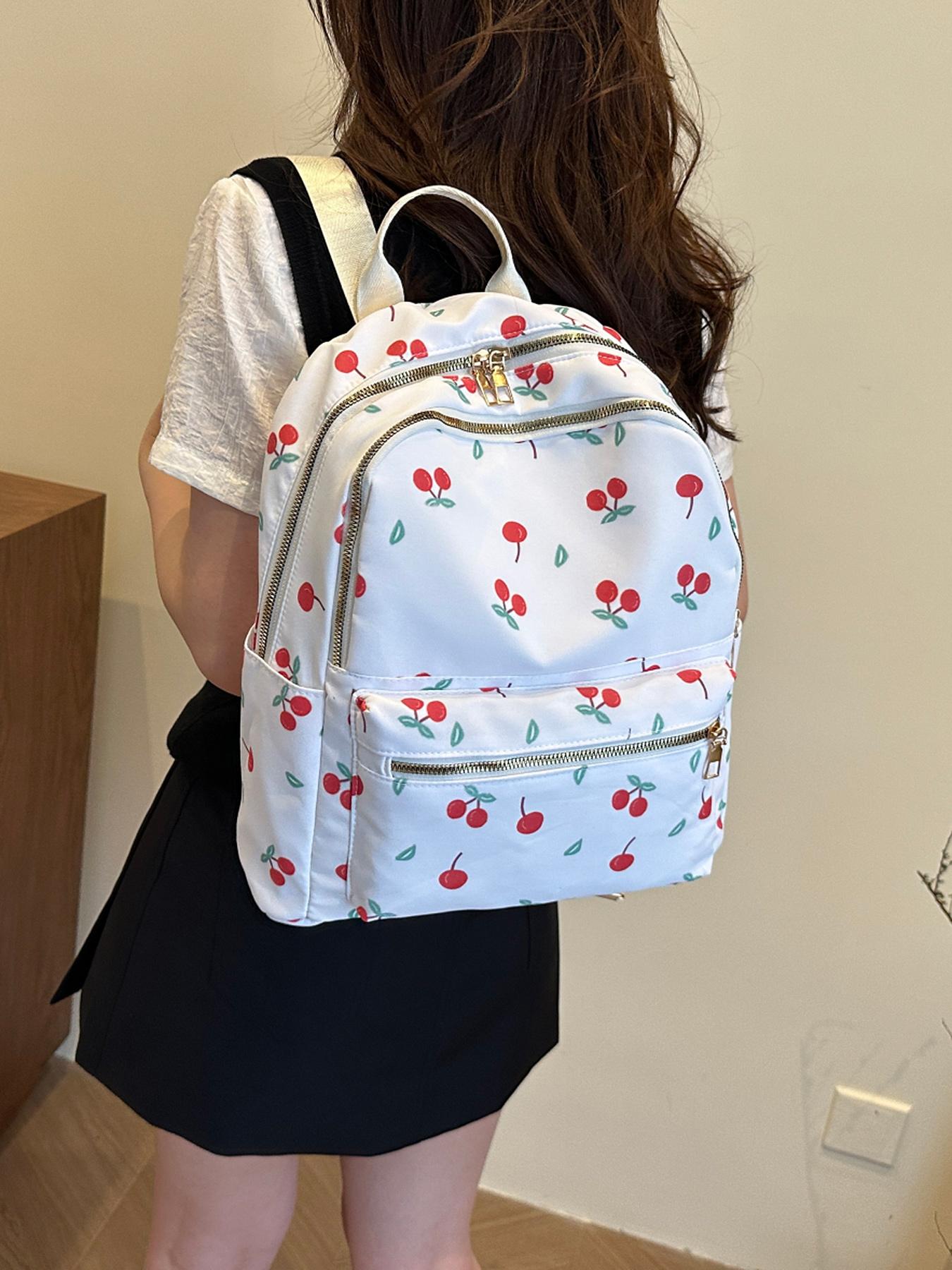 Sweet and fresh cherry element backpack, simple design, fashionable and exquisite, energetic campus style, versatile, light and practical, good for shopping and traveling, suitable for daily commuting  etc.