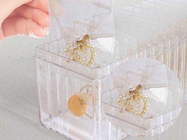 Aprilery Acrylic Jewelry Box Organizer, Clear Storage for 20 Portable Jewelry Bags, Travel Case for Earrings, Rings, Necklaces for Women