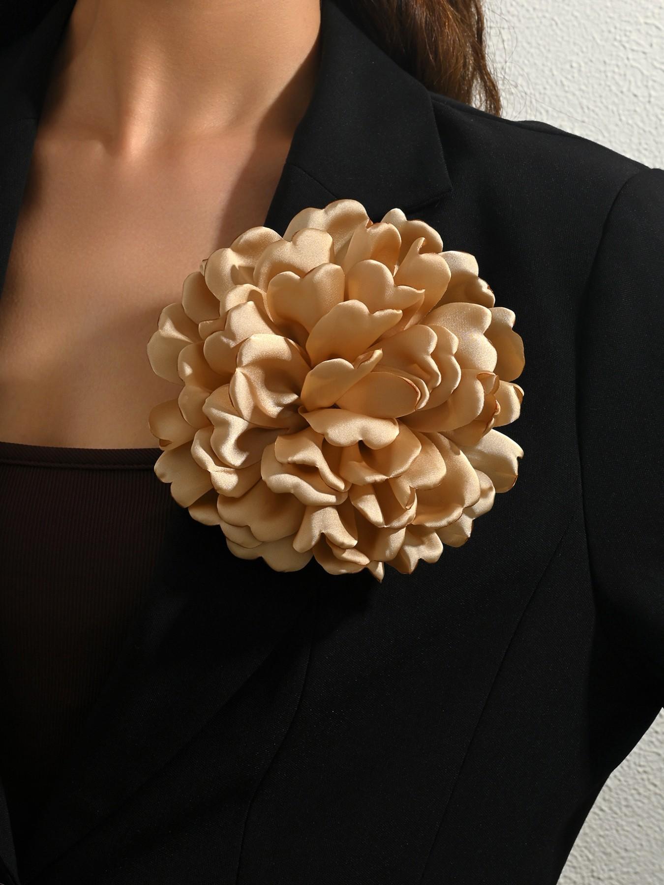 A handcrafted, multi-layered, and multicolored fabric floral brooch featuring a unique, elegant banquet-style design. This versatile corsage—equipped with a convenient duckbill clip—can be worn in various ways and is suitable for any occasion