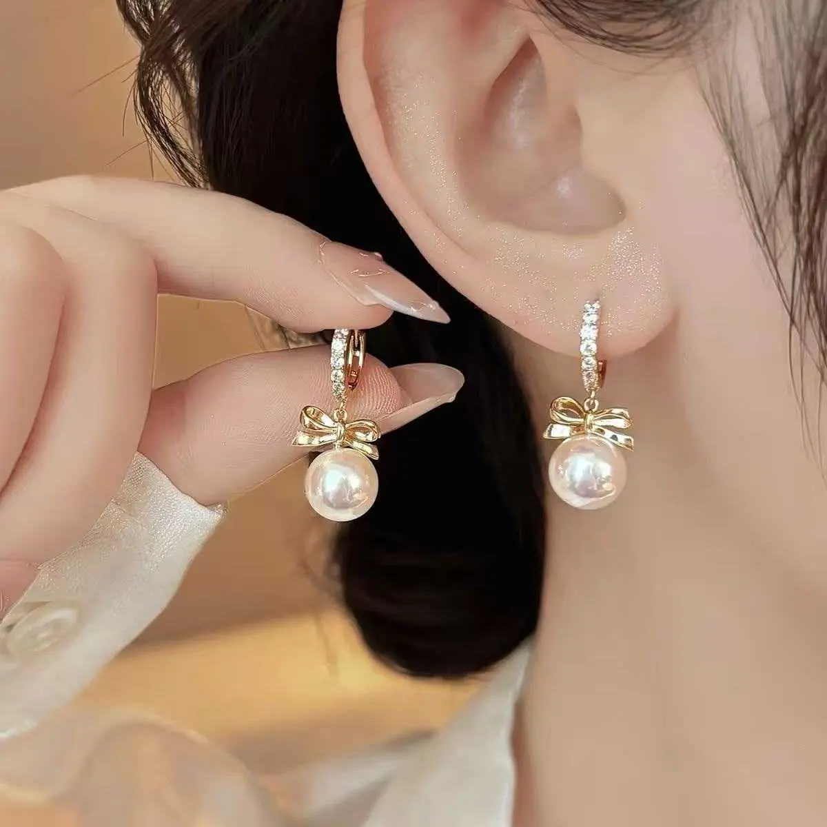 Bow Pearl Earrings for Women Niche Design Zircon Ear Jewelry 2026 High-End Elegant Ear Clips DL260804H15