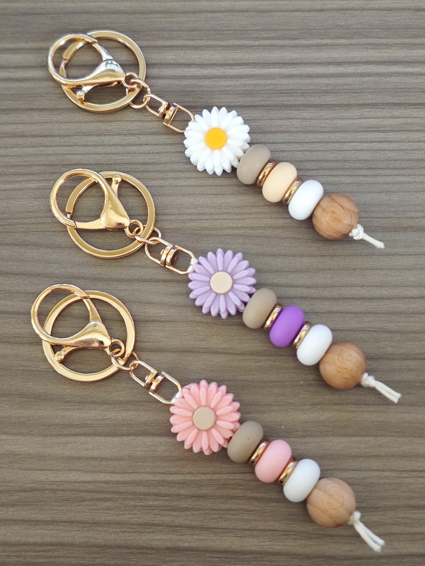 Fashionable and cute sunflower pendant keychain, suitable for daily wear, vacation and dating occasions, and also a surprising and exquisite small gift.