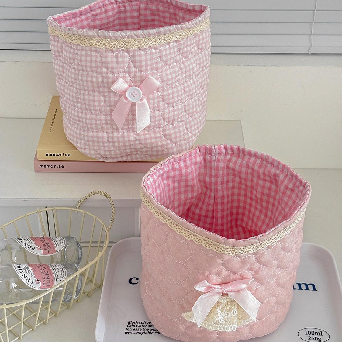 Cute lace bow patchwork storage basket, round fabric desktop organizer box, Instagram-style plaid print storage bin, soft padded makeup storage box, attractive pink bow storage bucket, foldable desktop storage basket