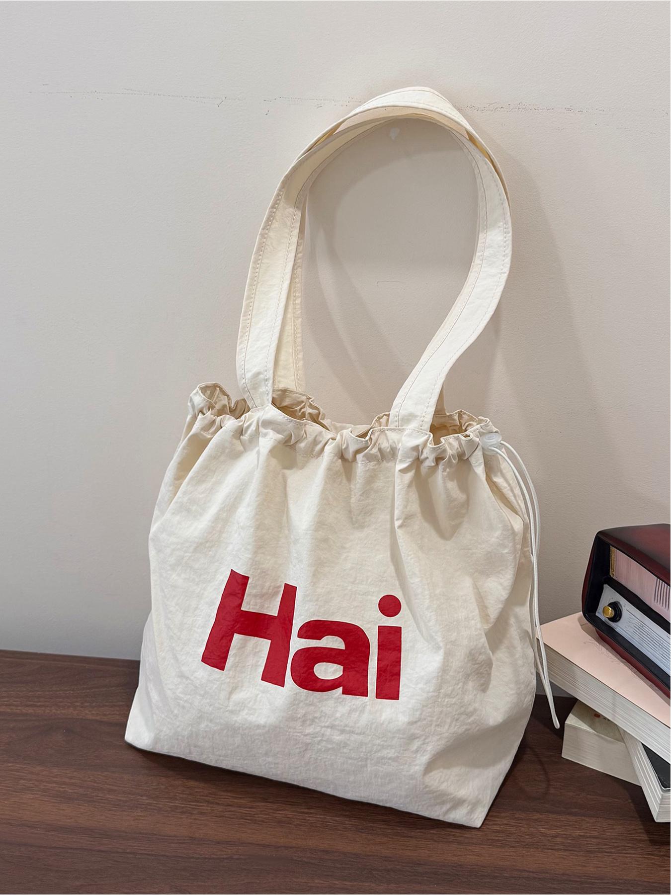 Large capacity drawstring tote bag with letters, simple casual shoulder bag, lightweight and comfortable, street style, work, shopping, underarm bag