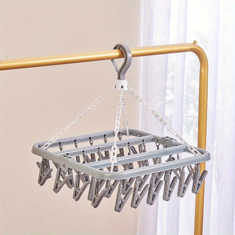 1PC Folding Clothes Hanger with Clips Multi functional Windproof and Sunscreen Clothes Hanger Folding Clothes Hanger Household Plastic Clothes Hanger 32 Clips