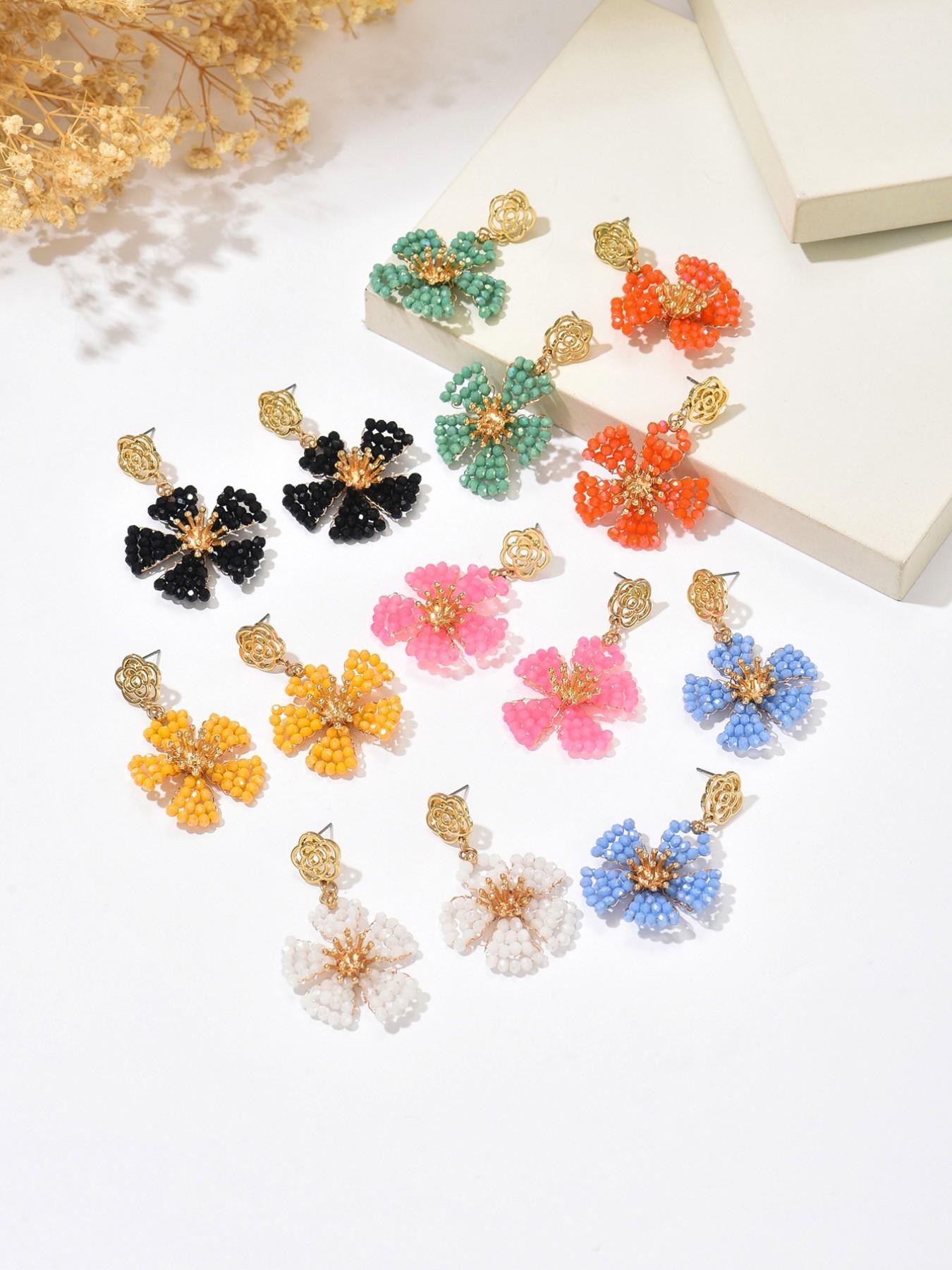 A pair of handcrafted, bohemian-style vintage dangle earrings featuring beaded floral designs—the perfect gift for a loved one, mother, or friend. An ideal present for Valentine's Day, Mother's Day, International Women's Day, wedding season, Thanksgiving