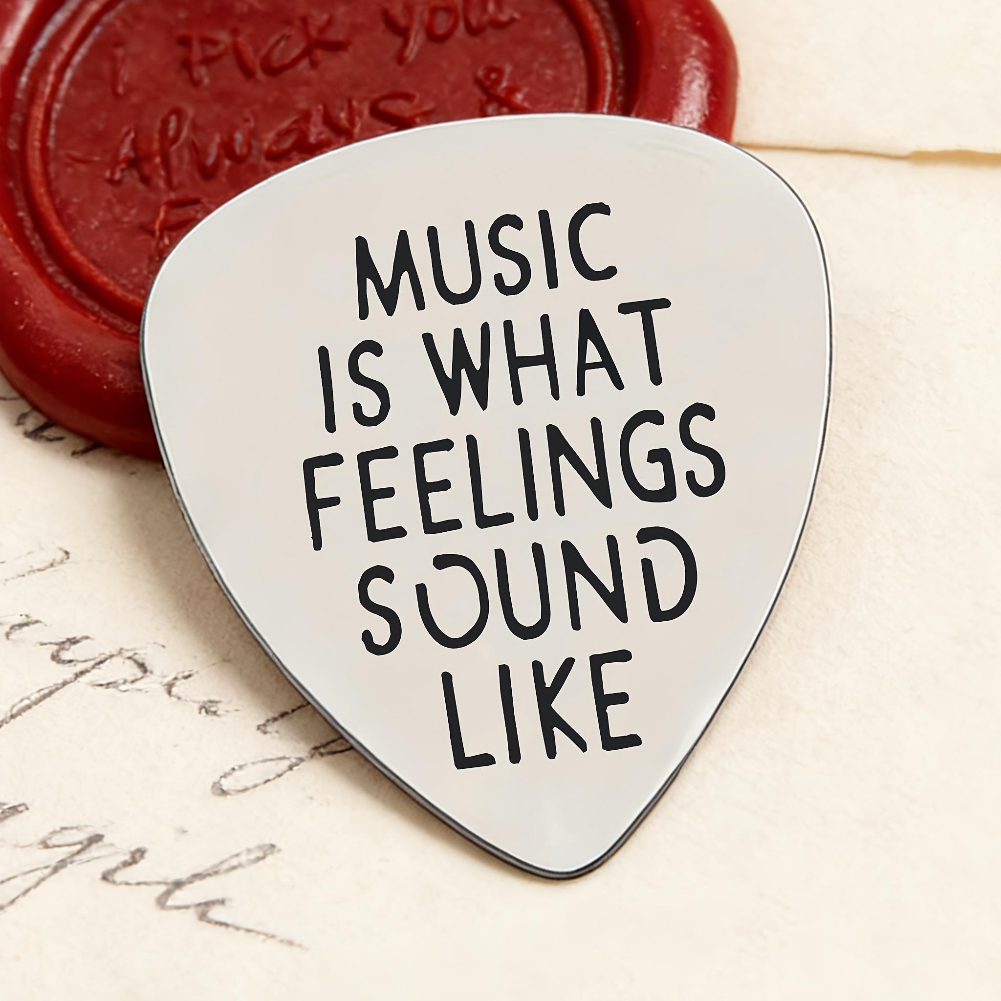 Stainless steel guitar pick, engraved with "MUSIC IS WHAT FEELINGS SO LIKE" literary music copy, suitable for music lovers, guitarists, birthdays, graduation, Christmas, music festivals gifts