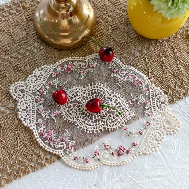 1 piece, a vintage-style handmade crochet round mat with polyester fabric, featuring elegant hollow designs and floral motifs, suitable for weddings, dining utensils, parties, Valentine's Day, Easter, St. Patrick's Day, and carnival celebrations.