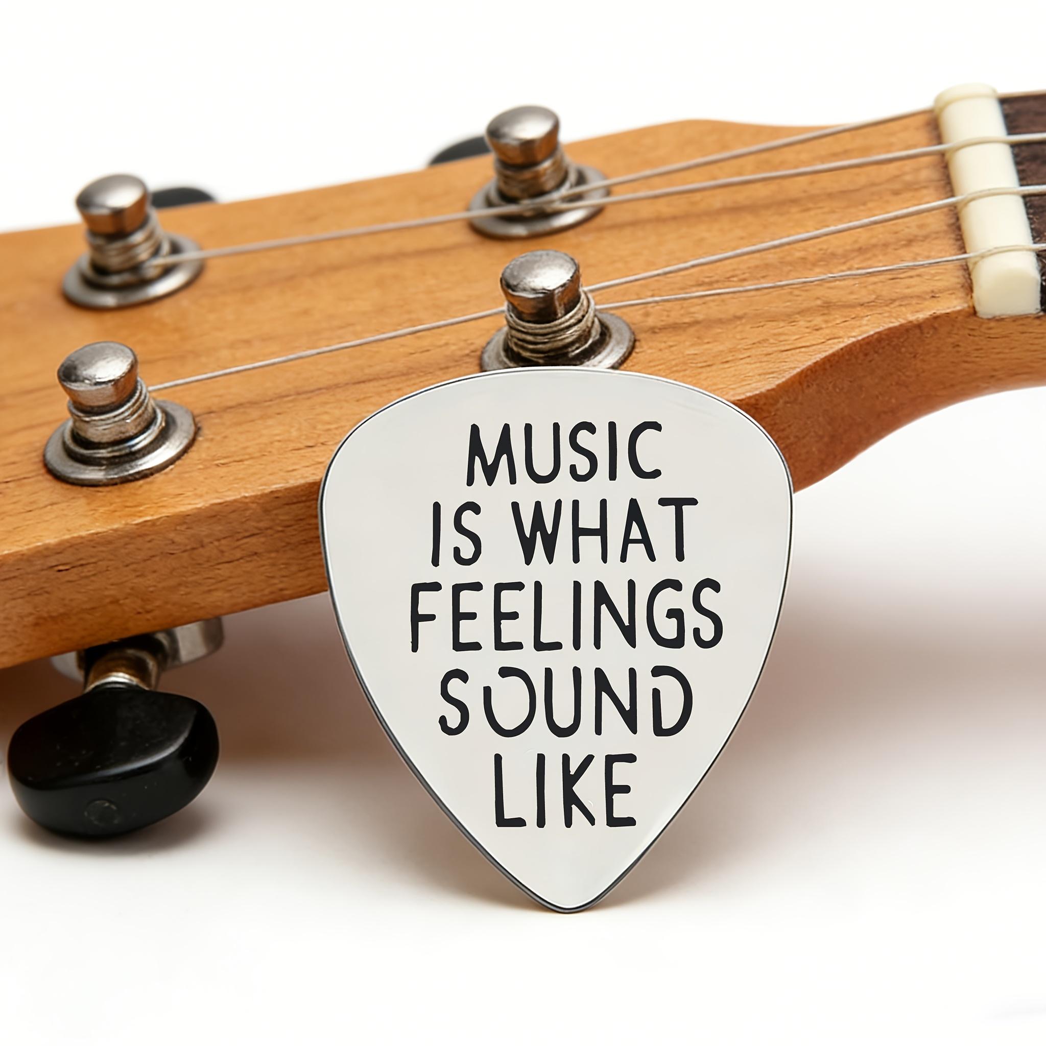 Stainless steel guitar pick, engraved with "MUSIC IS WHAT FEELINGS SO LIKE" literary music copy, suitable for music lovers, guitarists, birthdays, graduation, Christmas, music festivals gifts