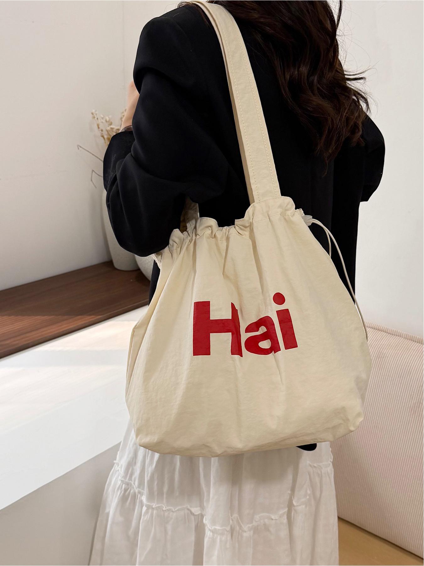 Large capacity drawstring tote bag with letters, simple casual shoulder bag, lightweight and comfortable, street style, work, shopping, underarm bag