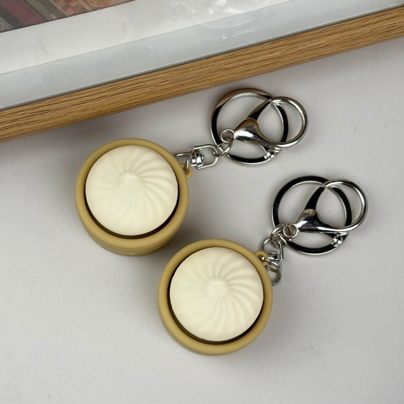 2-piece set - Simulated mini steamed bun steamer with release buttons and keychain. Stress-relieving keychain for student backpacks. Creative-shaped bag hanger decoration gift. Cute steamed bun keychain as an outlet for stress.