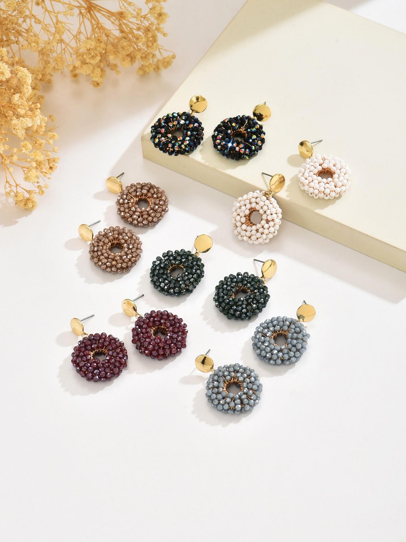 A pair of pure handmade, beaded circular dangle earrings featuring a dazzling "Bling-Bling" effect and a chic Bohemian resort style. These vintage-inspired, ethnic-style earrings offer a unique, versatile, and minimalist aesthetic—exuding elegance