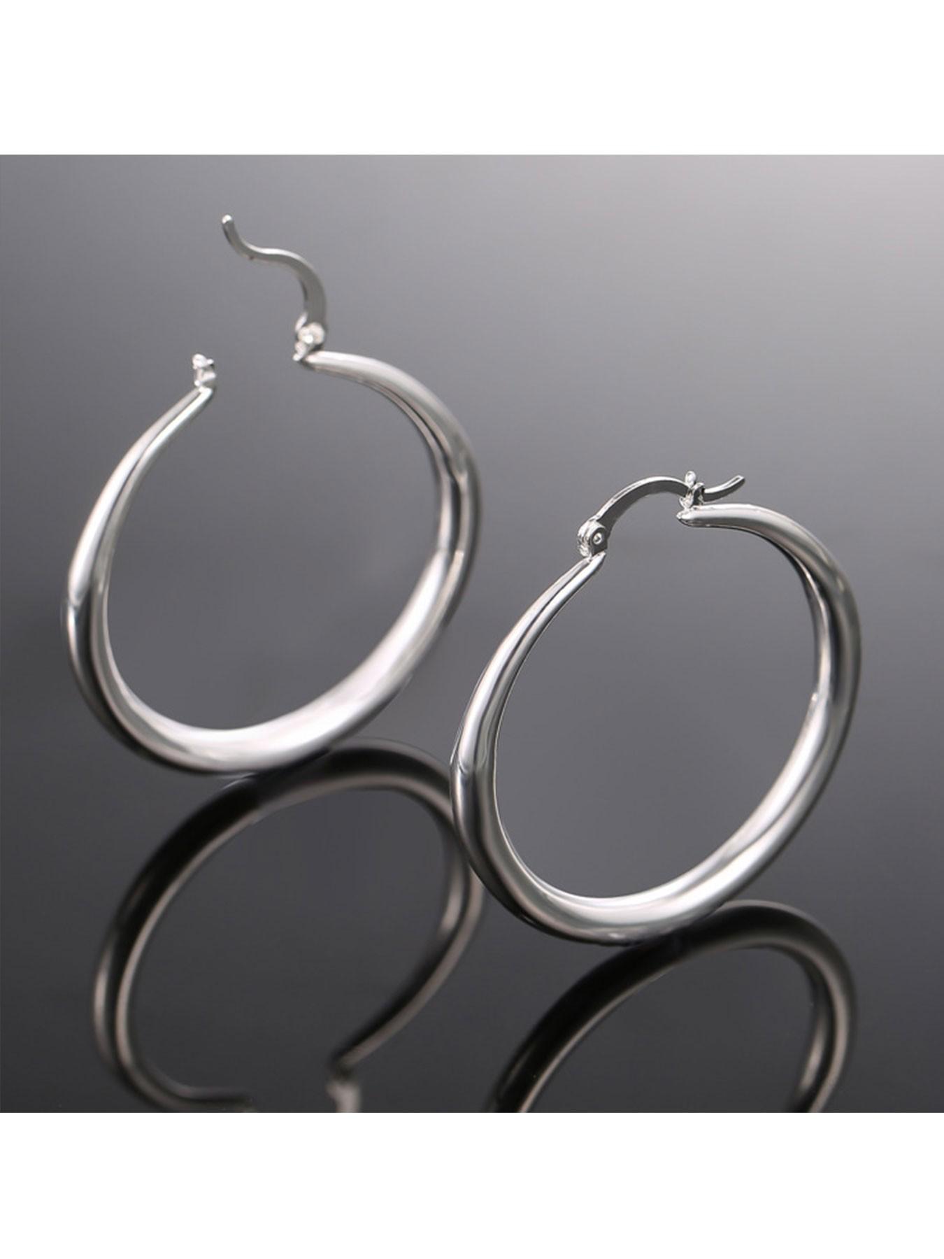 1 pair of gold/silver plated oversized hoop earrings with a minimalist, glossy punk style, perfect for holiday parties and streetwear looks.