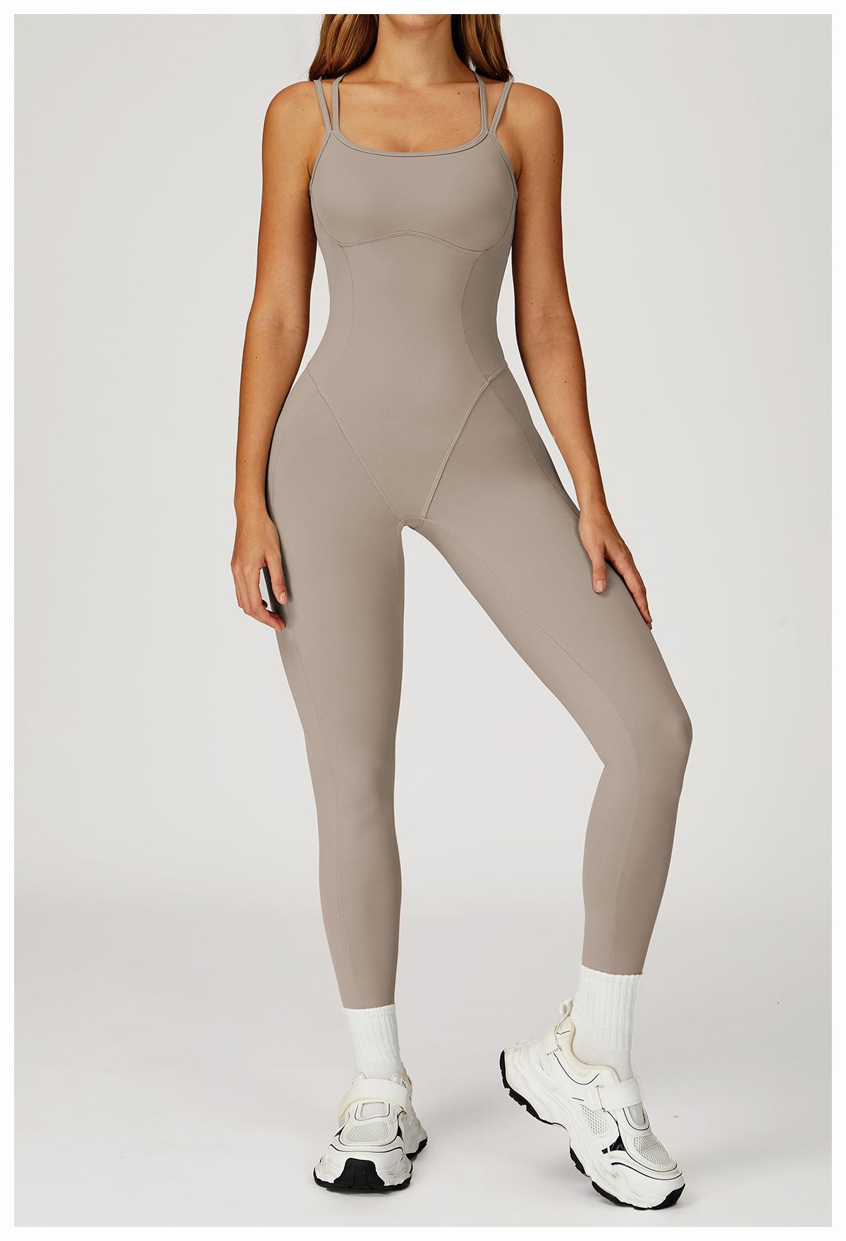 Nude-feel one-piece bodysuit with cross-back design, slim-fit yoga wear for outdoor running and fitness activities