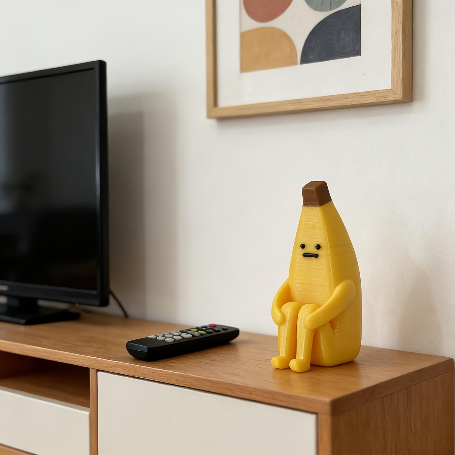 A 3D-printed "Anxious Banana" ornament, crafted from durable plastic—perfect for use as a home tabletop display, office decor, or a unique decorative accent.