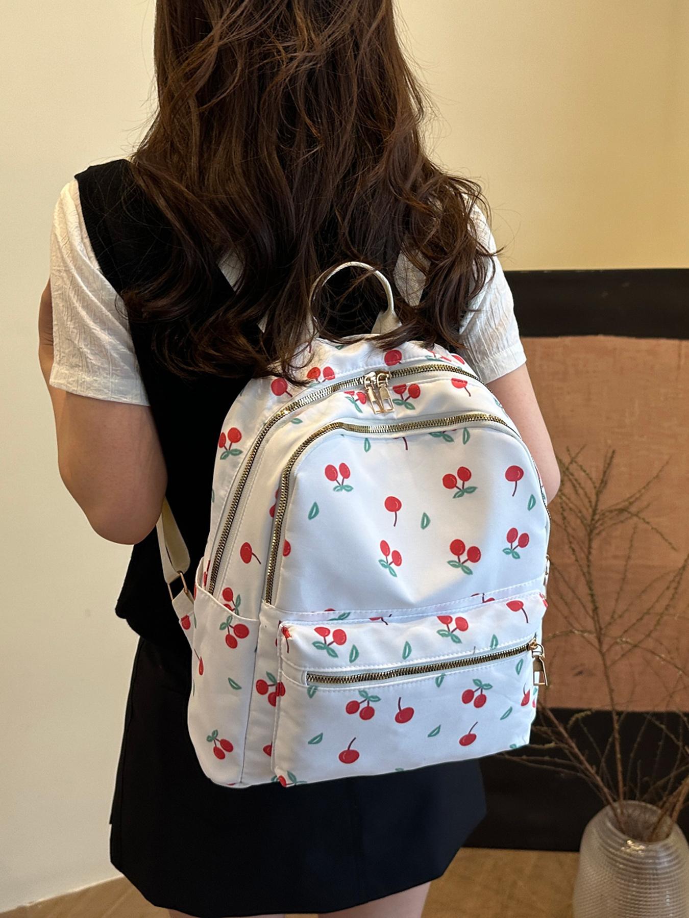Sweet and fresh cherry element backpack, simple design, fashionable and exquisite, energetic campus style, versatile, light and practical, good for shopping and traveling, suitable for daily commuting  etc.