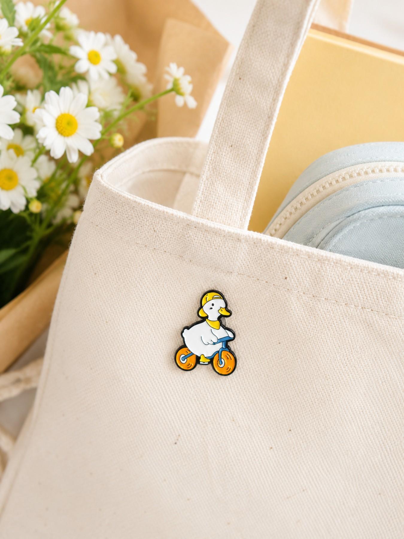 Duck Riding Bicycle, Enamel Brooch Pin, Glossy Alloy Hard Enamel, for Women Men Cyclists Animal Lovers and Collectors, for Denim Jackets Backpacks Canvas Bags Hats and Pouches, Playful Kawaii Casual Style, Gift for Friends and Duck Fans