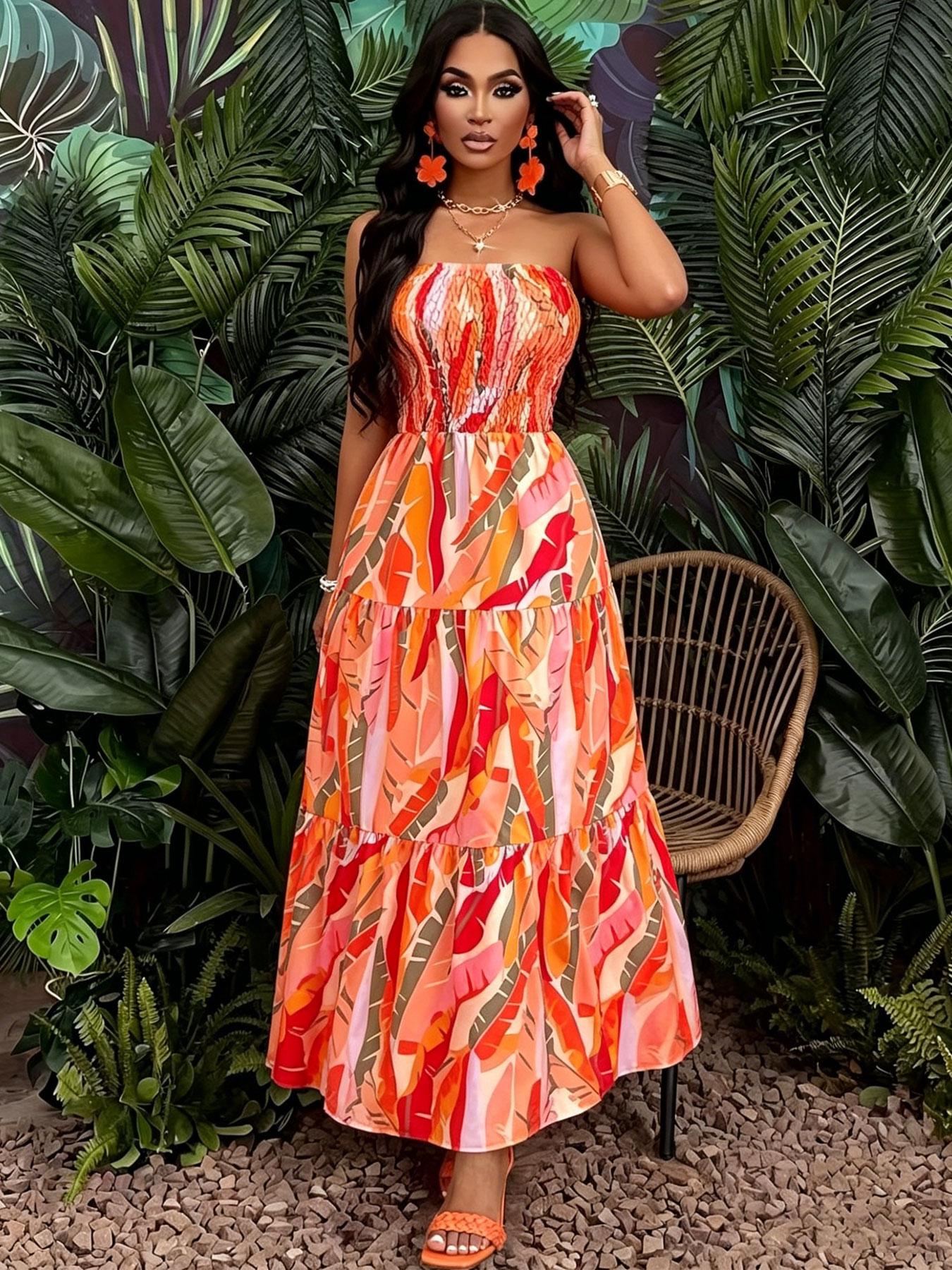 A women's orange-red color-block tropical floral print strapless tube long fashionable dress, suitable for summer, island vacations, tropical trips, and summer parties.