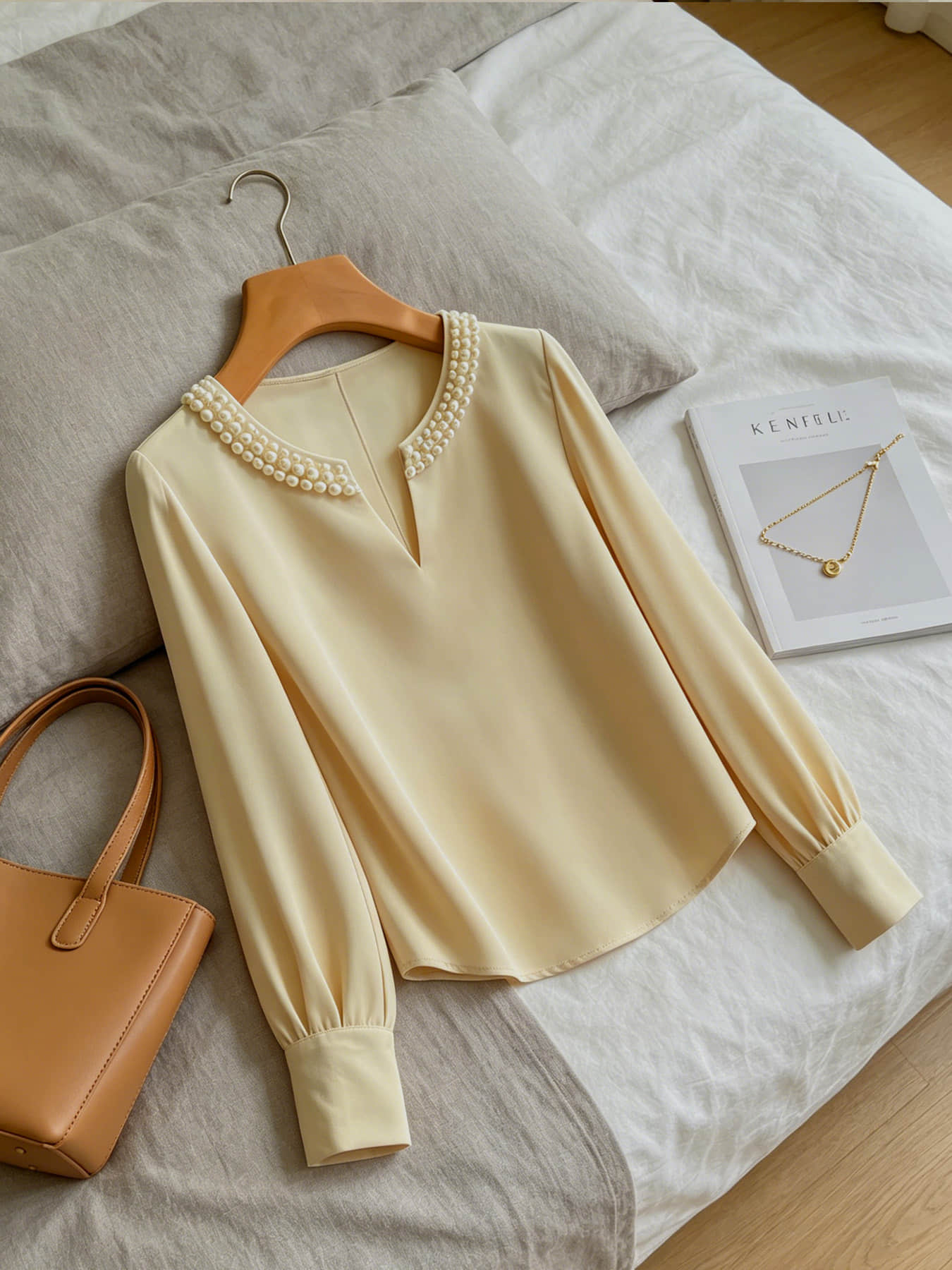A women's pearl collar top, Blouse, with a V-neck small open neck, loose and versatile, showing off a slimming temperament. It is suitable for summer, business negotiations, customer meetings, commuting