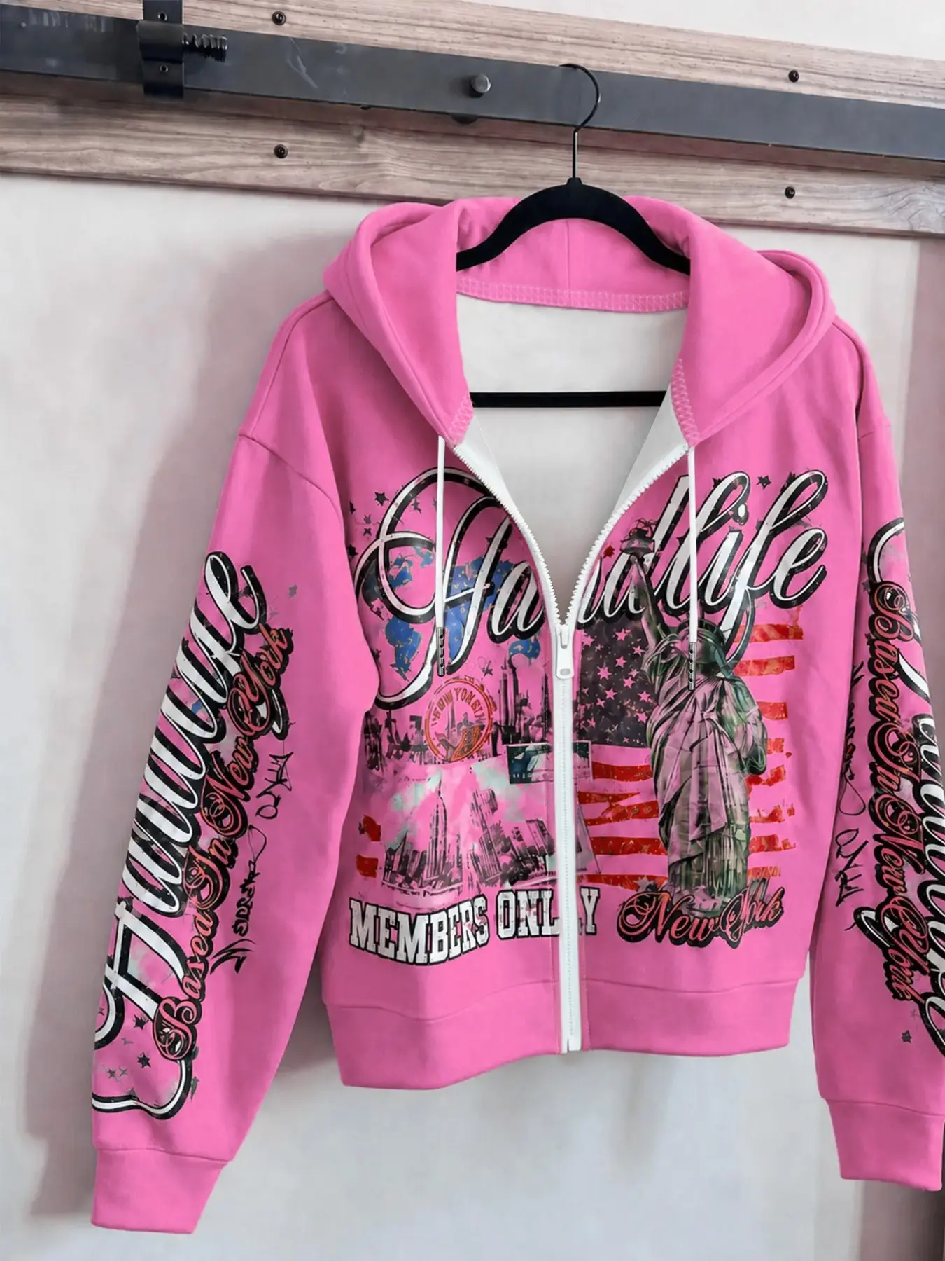 Vintage New York Pattern Zip-Up Hoodie, Retro Collage Print, Statue of Liberty and 'hardlife' Text, Bright, Y2K Streetwear Style, Casual Graphic Hoodie