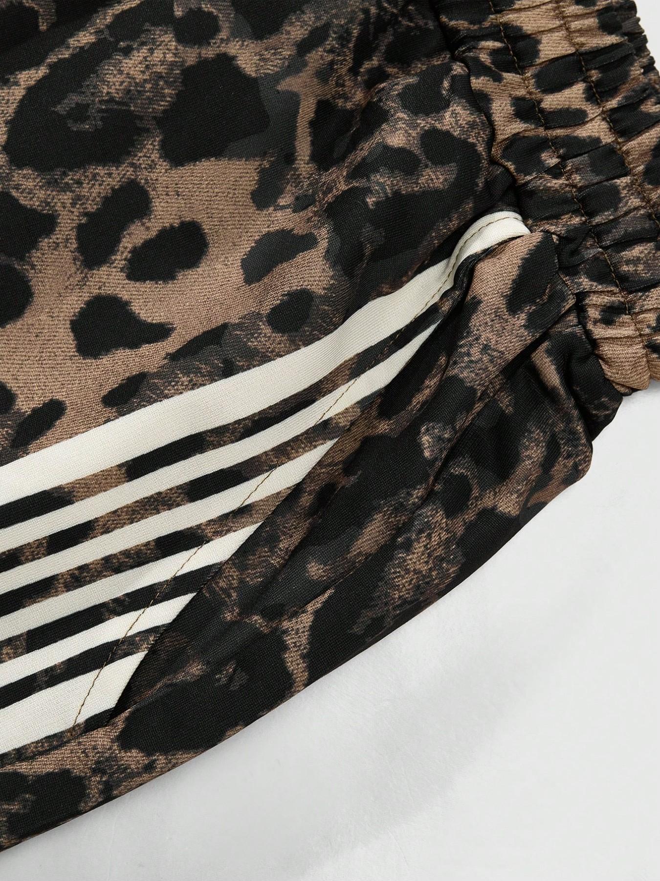 Y2K Leopard Print Track Pants with White Stripes, Streetwear Baggy Sweatpants for Men/Women, Elastic Waist Drawstring Casual Trousers, Retro 90s Hip Hop Fashion, Loose Fit Joggers for Street Style, TikTok Viral Aesthetic, Comfortable Soft Fabric,