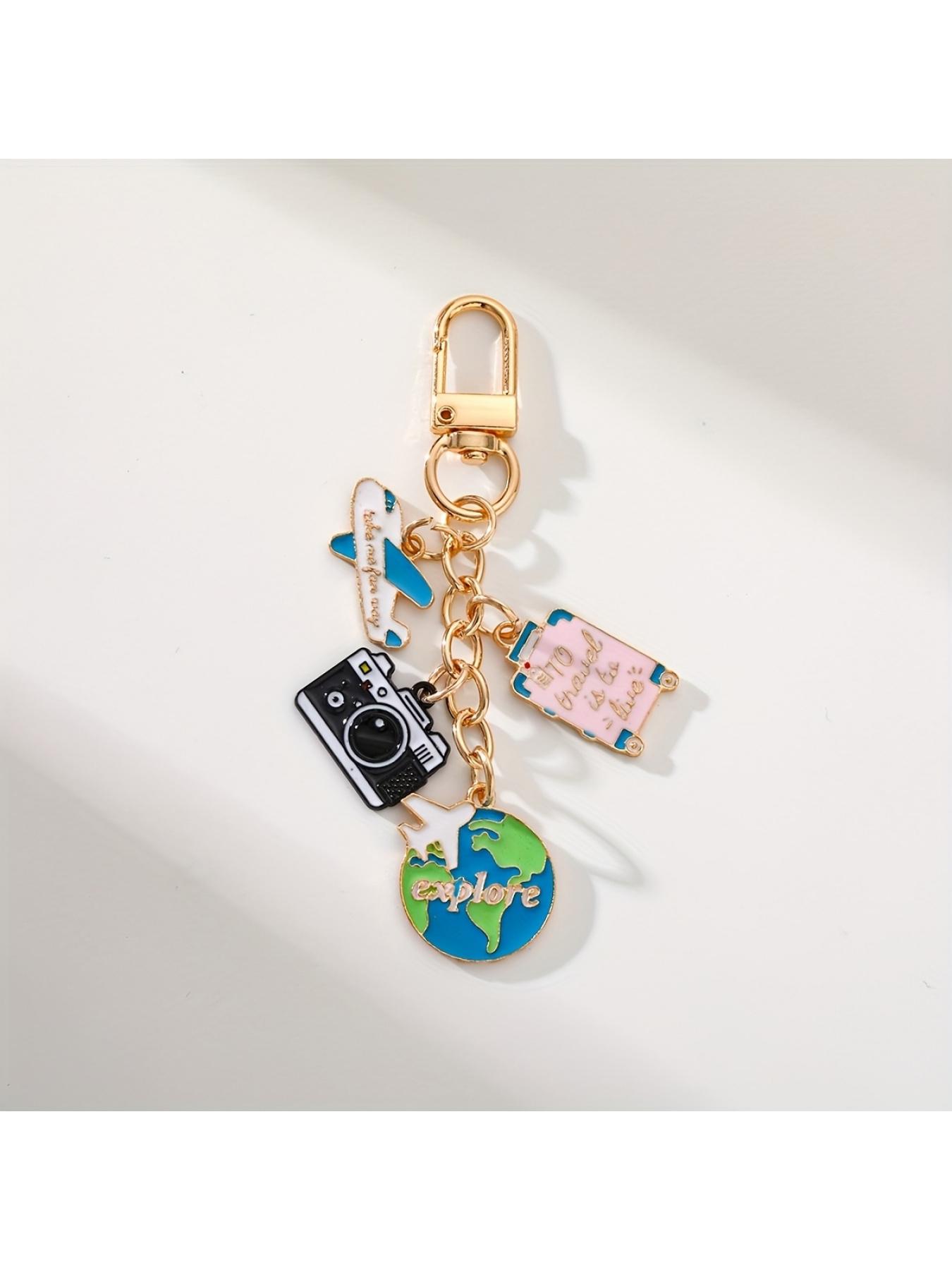 1pc Travel-themed keychains - Containing aircraft, camera, Earth and luggage accessories, stylish enameled metal keychains are perfect for decorating and the perfect gift for travelers