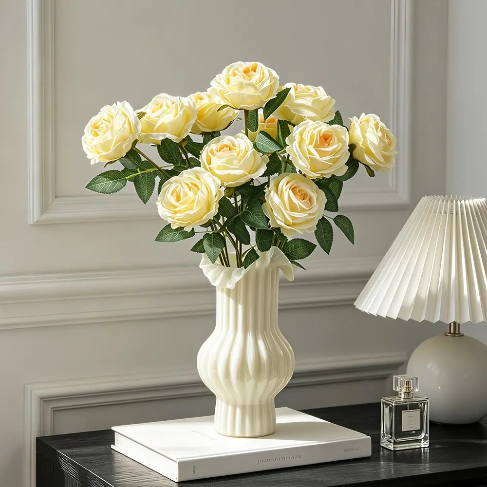 A bouquet of 10 yellow artificial roses, each with a 19.69-inch-long stem, perfect for Valentine's Day gifts, wedding bouquets, home decor, and table centerpieces