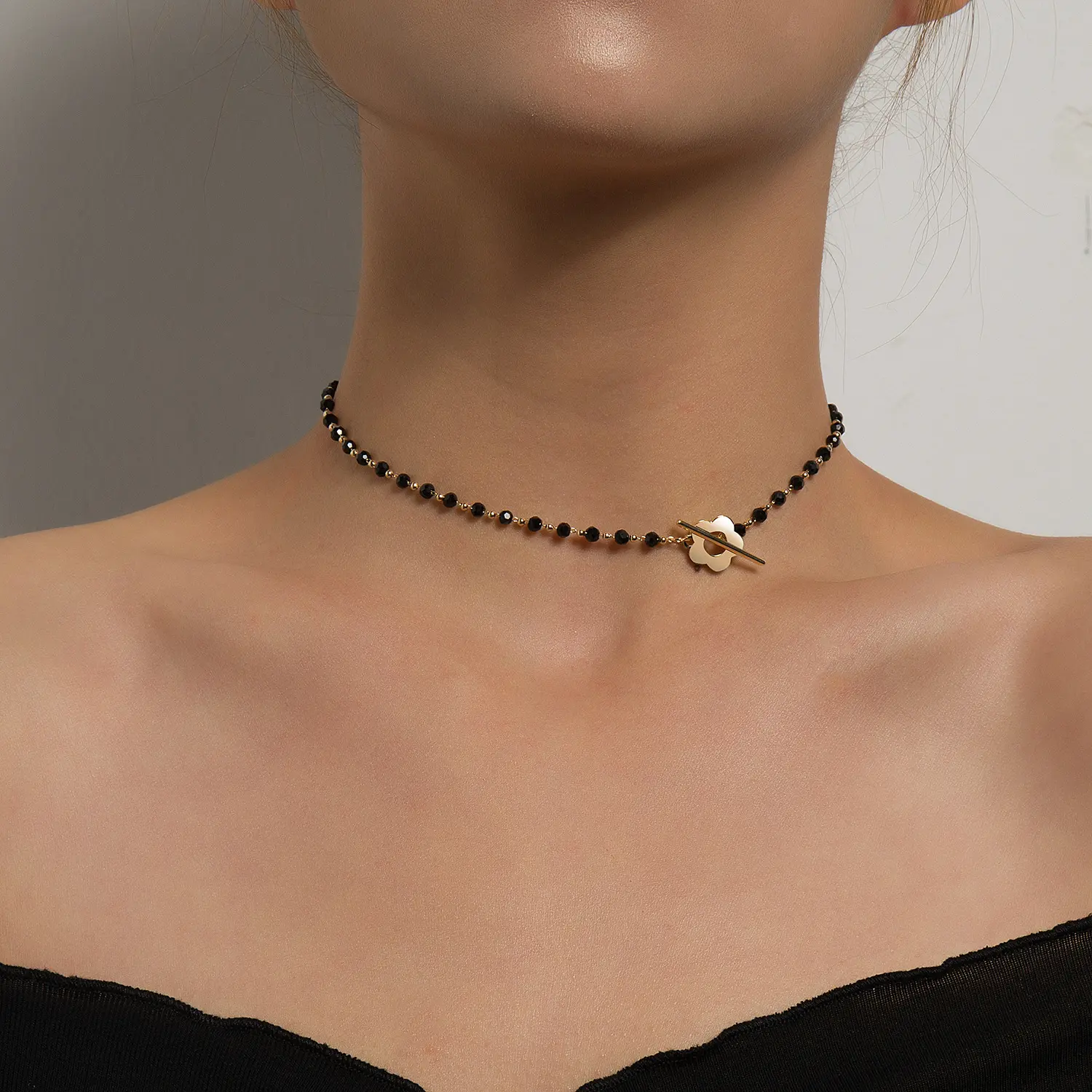 Elegant Gold-Tone Choker Necklace with Faceted Black Crystal Beads, Hollow Flower Charm, and Toggle Clasp for Women, Female, Beaded Choker Necklace, Choker Length