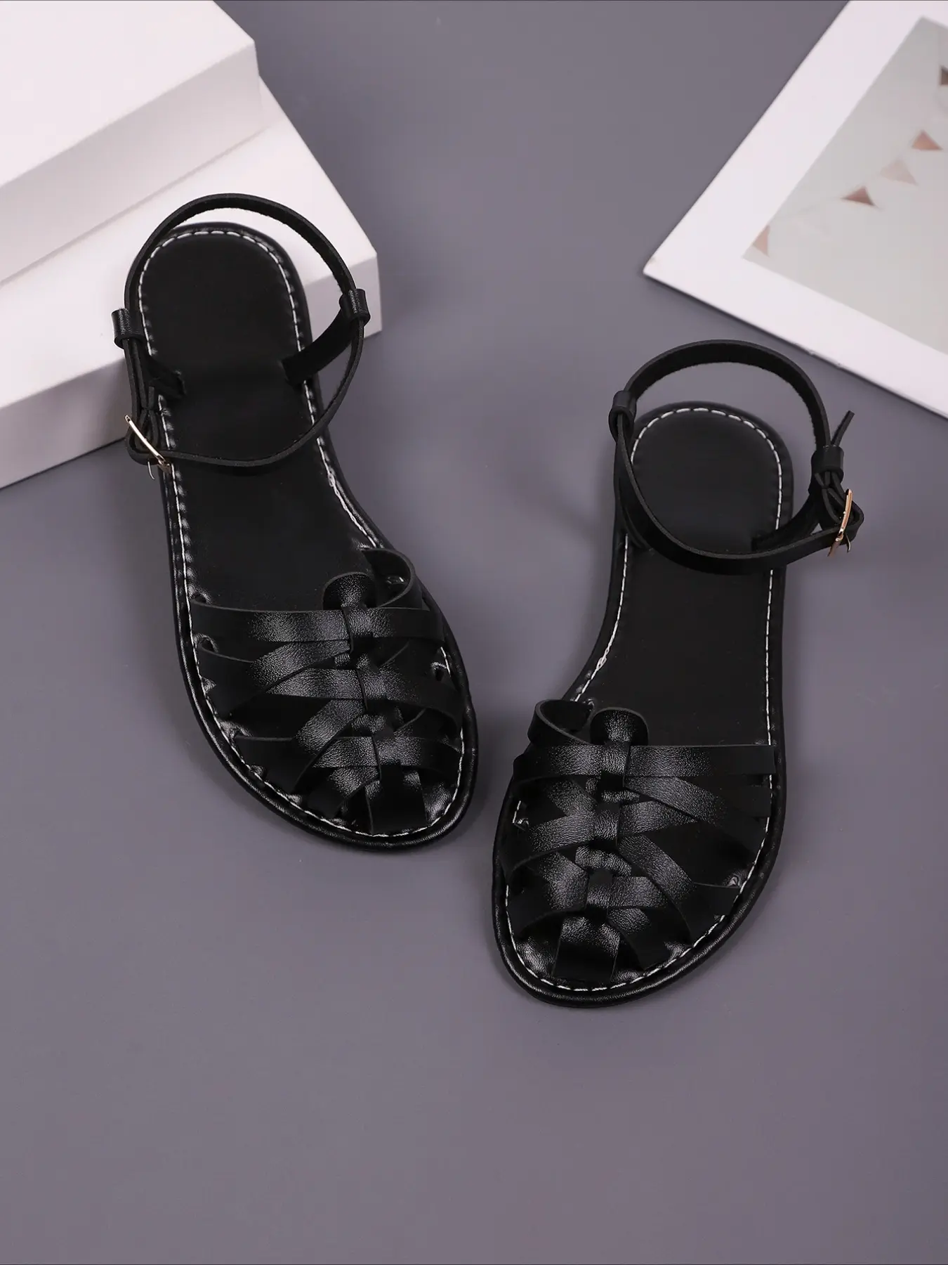 New Arrival Women's Closed-Toe Flat Roman Casual Summer Sandals. Breathable flat sandals The toe cap features crisscross woven hollow-out construction, which protects your toes from bumps and abrasions while maintaining great breathability.
