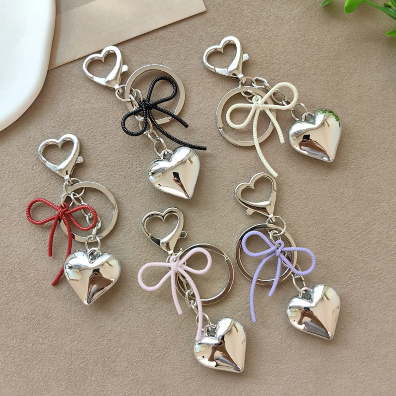 Minimalist Heart Alloy Keychain with Black Rope Bow Charm, Small Unisex Accessory for Everyday Wear on Backpacks & Earphone Cases, Heart Shape
