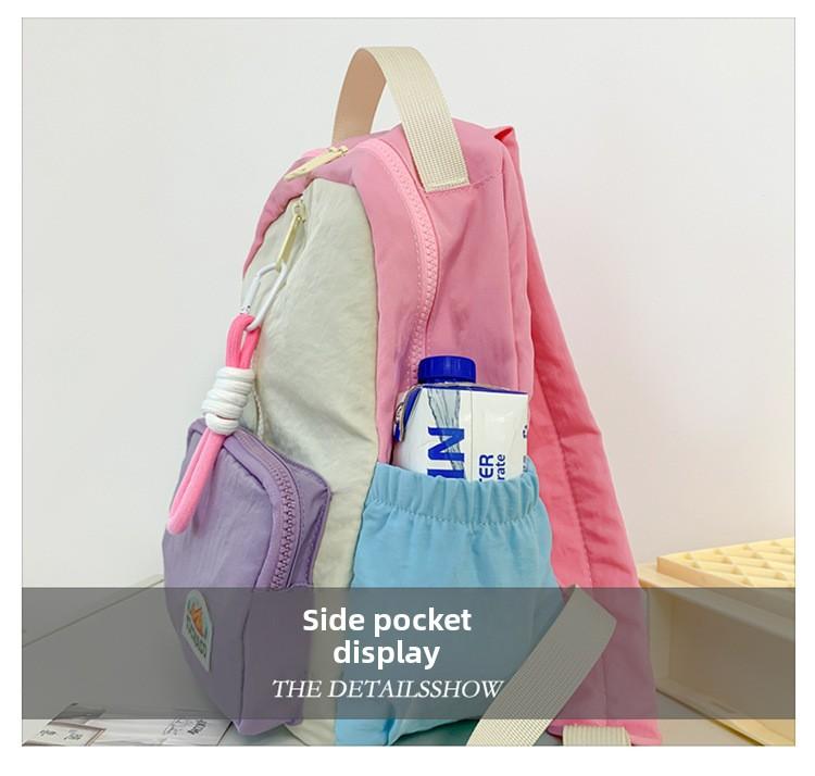 Boys' and girls' backpack 2026 new fashion color-blocking kindergarten baby school bag large capacity children's backpack