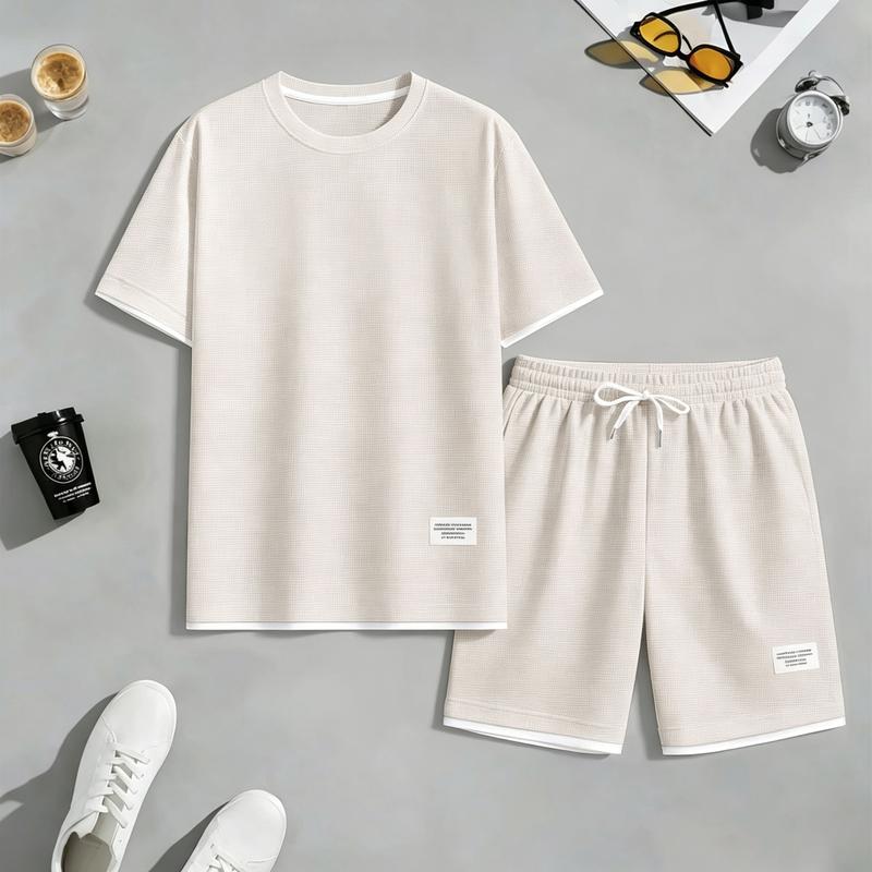 Lightweight waffle textured short sleeve crew neck top matched with drawstring knee-length shorts, neat contrast hem minimalist design, breathable casual co-ord set to build effortless summer daily outfits and clean modern mensfashion