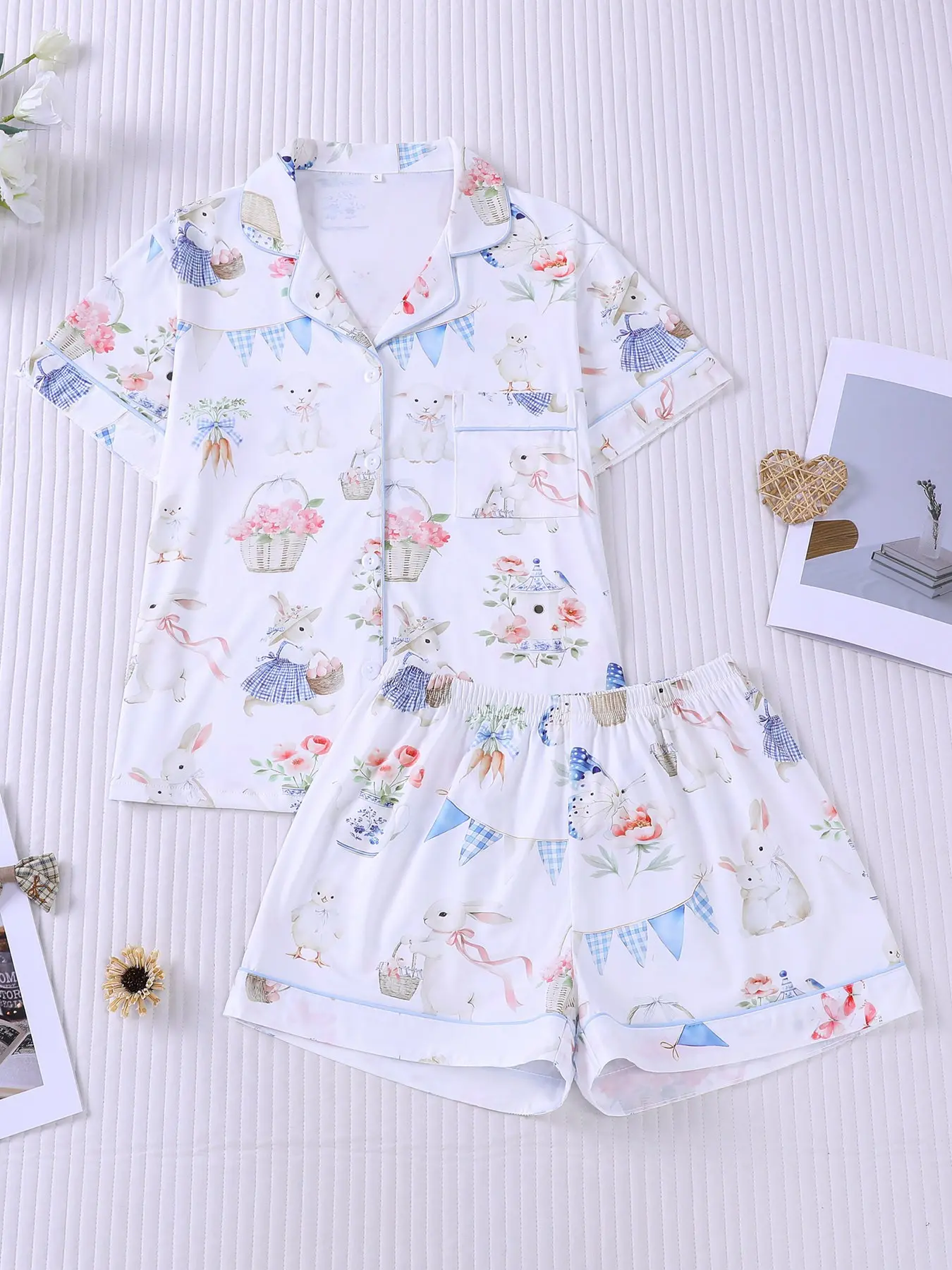 Women's 2-piece pajama set with watercolor bunnies, chicks, flowers, Floral, carrots and plaid bunting prints, pastoral style with light blue piping. Lapel top with pocket, elastic waist shorts, soft fabric for all-season daily home loungewear nightwear