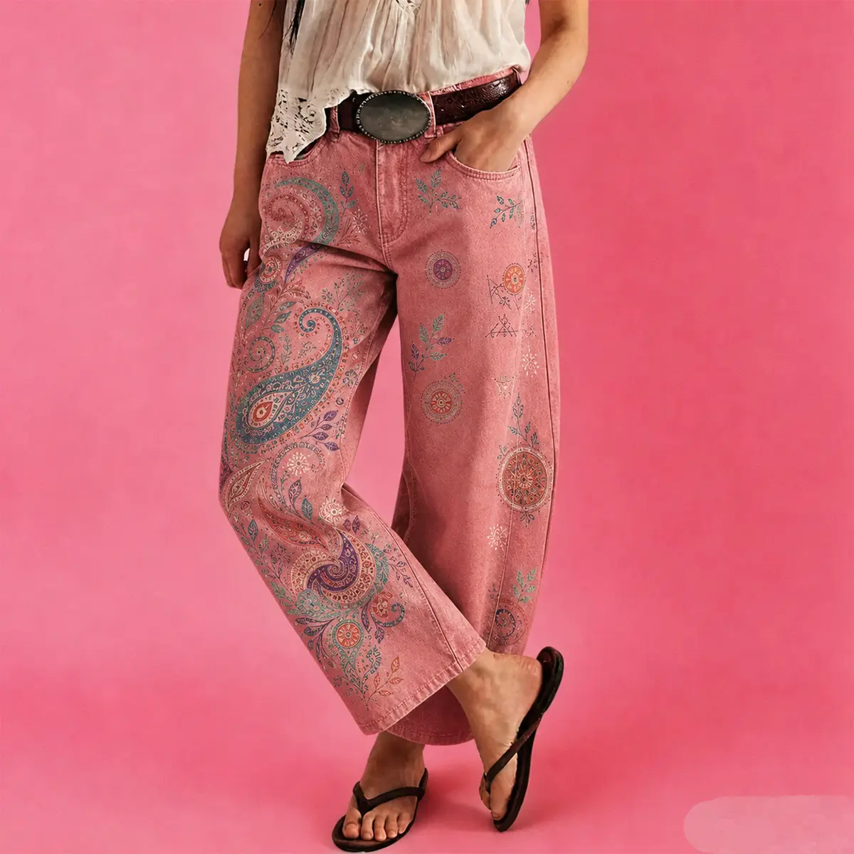 Women's vintage-wash wide-leg jeans; Y2K-style loose-fitting trousers; soft pink base with a bohemian floral print; suitable for year-round outdoor activities and streetwear styling.,back to school shopping