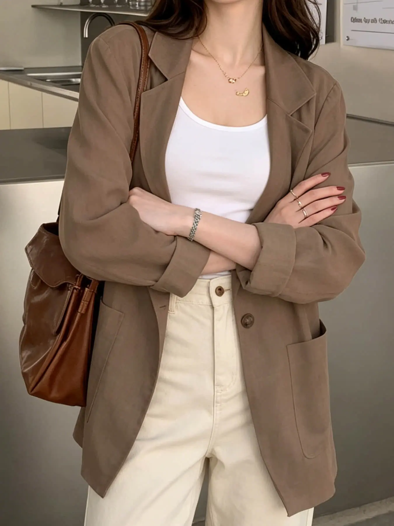 A fashionable women's Korean style minimalist style loose, Oversized and versatile Solid Button Blazer suit jacket, suitable for summer, perfect for exploring stores, checking in, spring, picnicking, beach vacations