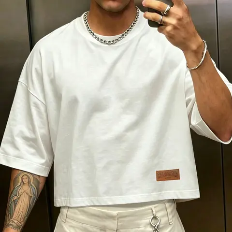 Men's T-shirt featuring a short, loose fit with dropped shoulders; made from 100% Sorona polyester fabric and accented with a minimalist small leather logo. An essential basic—perfect for hot summer vacation outfits. Casual tee
