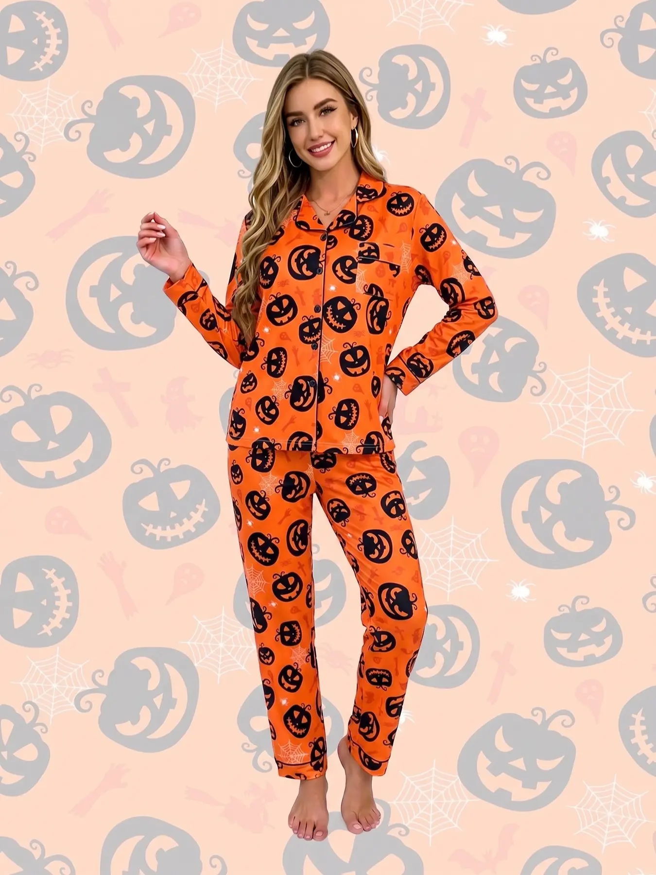 Women's 2-piece pajama set, orange Halloween jack-o'-lantern prints. Features pumpkins, spider webs & ghosts. Classic Halloween style. Black trim, lapel top with pocket, elastic waist long pants, soft comfy all-season women's loungewear