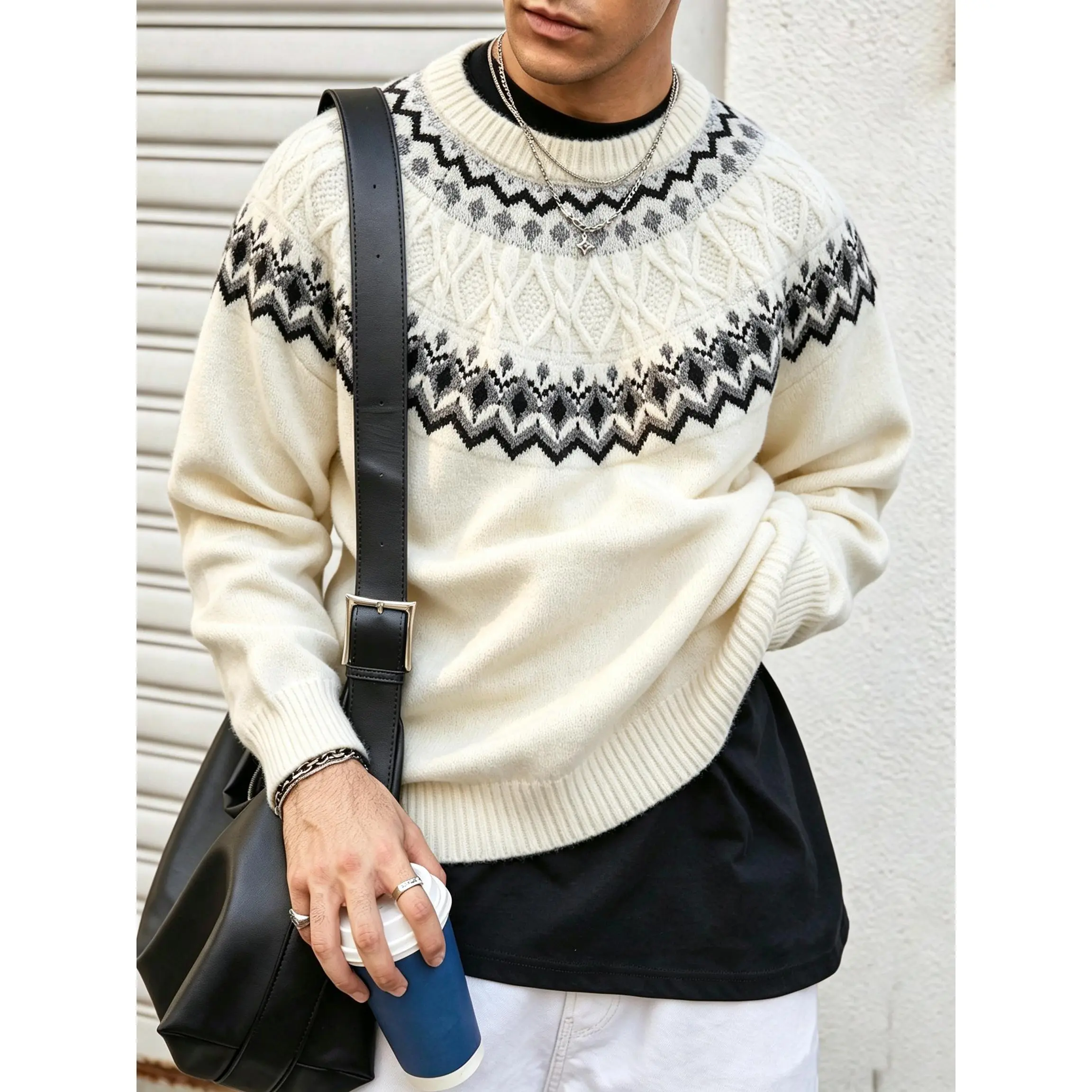 This trendy mensfashion crew‑neck knit sweater features classic fair isle jacquard patterns and cable knit texture. Relaxed loose silhouette brings cozy wearing experience, great for layering and building vintage casual outfits for men.