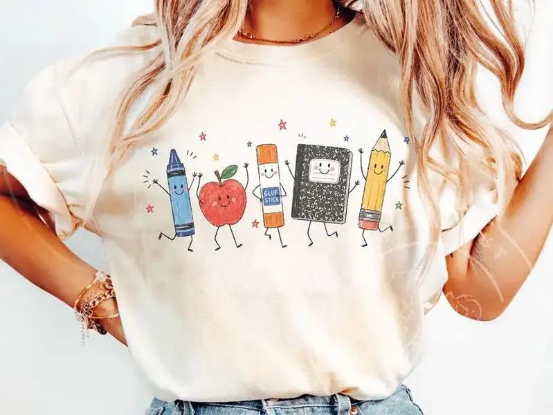 Cute School Supplies Heritage Graphic Tee, Aesthetic Back To School Spirit Shirt, Radiant Teacher Crayon Apple Pencil Notebook Top, Thoughtful Classroom Sublimation Gift Boutique Heritage Apparel