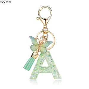 Cute Mint Green Initial Keychain for Women • Personalized Resin Glitter Letter Keyring with Butterfly Charm and Tassel Pastel Monogram Backpack Purse Charm Gift